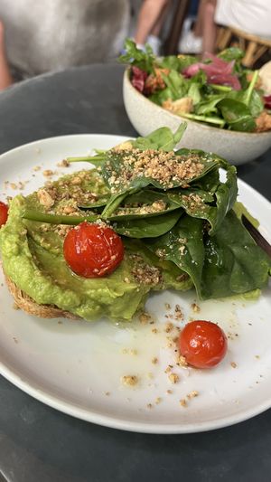 avocado toast and a side salad   at Café Janis in Lisbon
