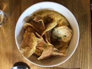 Hummus de lenteja roja con chips at Lanbroa in Pamplona