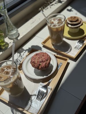 Two cafe lattes, one strawberry muffin, and one cinnamon muffin   at Ovgo B.A.K.E.R Edo St in Tokyo