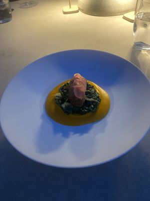 Lentil patty on chard, topped with sliced radish  at Pelegrini in Sibenik