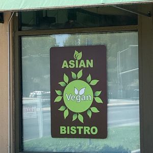 Signage on windows with new restaurant name  at Asian Vegan Bistro in Bakersfield