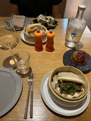Mushroom bao with wakame & vegan bomb - vegan mince meatball on a bed of sweet & sour beet hummus  at Three House Hotel & Gastrobar in Funchal