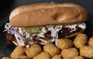 BBQ and slaw sandwich with a side of tots  at Your Local Seitanist in Chattanooga