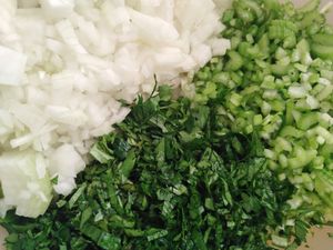 Living dangerously today, Dicing with Dhania. Preparing fresh ingredients for Bhadjies. Chilli Bites are popular at markets.  at Noel's Pantry in Eastern Cape