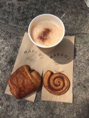 chocolate croissant, pain au chocolat and a Chai Latte with oat milk  at Margo's Amsterdam - Jordaan in Amsterdam