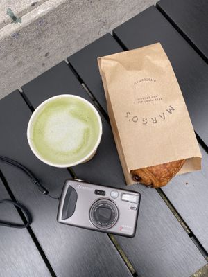 matcha latte with oat milk and pain au chocolat   at Margo's Amsterdam - Jordaan in Amsterdam