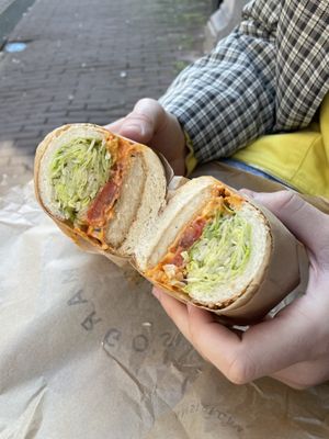 Crispy « chicken » chili mayo sandwich on while wheat oat bread  at Margo's Amsterdam - Jordaan in Amsterdam