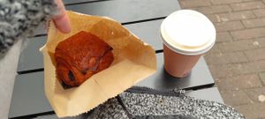 Huge chocolate croissant with a jasmine tahini latte  at Margo's Amsterdam - Jordaan in Amsterdam