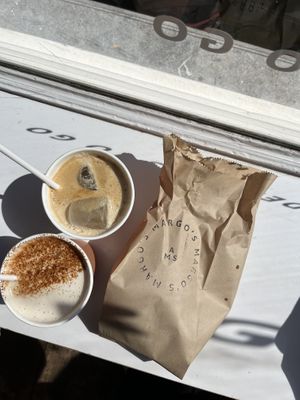 chai latte and caramel macchiato with oat milk   at Margo's Amsterdam - Jordaan in Amsterdam