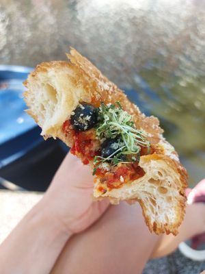 Olives, tomato, vegan parm at Margo's Amsterdam - Jordaan in Amsterdam