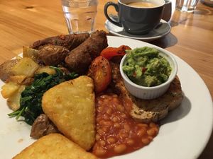 Oat latte, vegan breakfast + hash browns   at The Social Bar & Cafe in Bristol