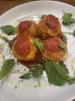 Rice croquettes  at Unique (V) Pizzeria SUKHASANA in Osaka