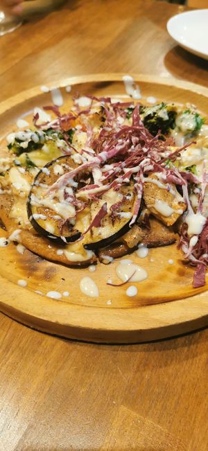 Pizza at Unique (V) Pizzeria SUKHASANA in Osaka