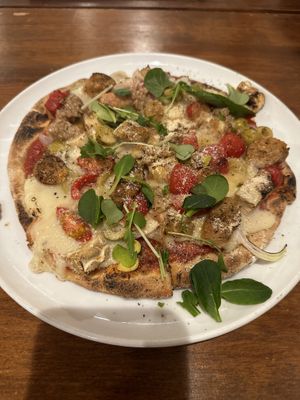   at Unique (V) Pizzeria SUKHASANA in Osaka