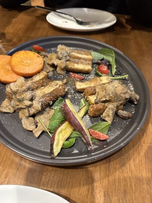 Homemade tempeh  at Unique (V) Pizzeria SUKHASANA in Osaka