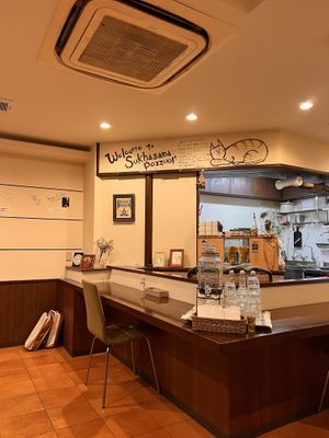   at Unique (V) Pizzeria SUKHASANA in Osaka