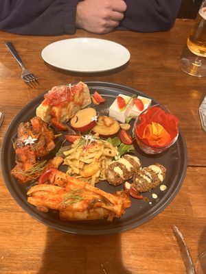   at Unique (V) Pizzeria SUKHASANA in Osaka