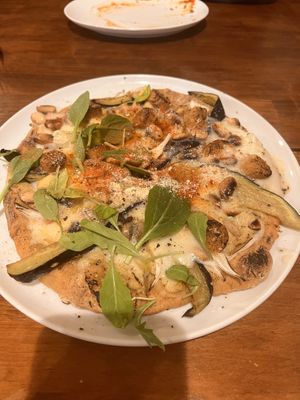   at Unique (V) Pizzeria SUKHASANA in Osaka