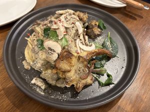 Pasta with cashew based cheese, mushrooms md a soy milk cream.  at Unique (V) Pizzeria SUKHASANA in Osaka