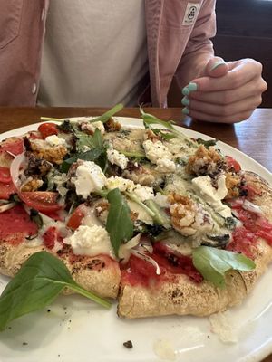 Meatball pizza  at Unique (V) Pizzeria SUKHASANA in Osaka