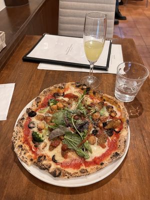   at Unique (V) Pizzeria SUKHASANA in Osaka