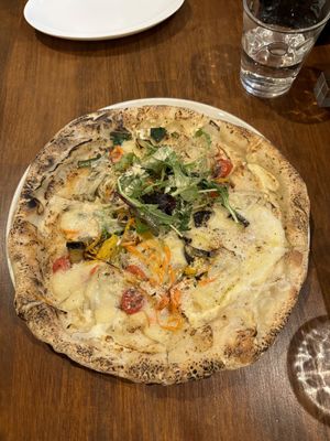   at Unique (V) Pizzeria SUKHASANA in Osaka