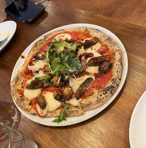   at Unique (V) Pizzeria SUKHASANA in Osaka