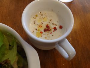 garlic soup with pink peppercorn  at Unique (V) Pizzeria SUKHASANA in Osaka