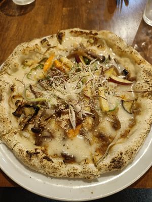  at Unique (V) Pizzeria SUKHASANA in Osaka