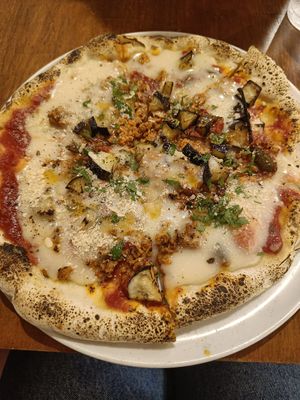  at Unique (V) Pizzeria SUKHASANA in Osaka