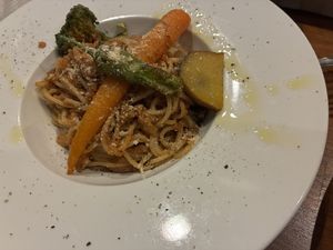   at Unique (V) Pizzeria SUKHASANA in Osaka