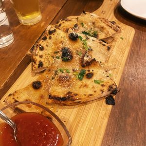 Garlic bread starter  at Unique (V) Pizzeria SUKHASANA in Osaka