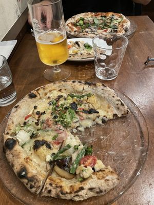   at Unique (V) Pizzeria SUKHASANA in Osaka