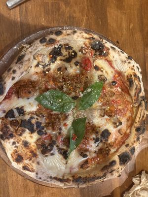   at Unique (V) Pizzeria SUKHASANA in Osaka