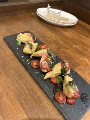   at Unique (V) Pizzeria SUKHASANA in Osaka