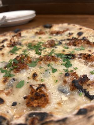   at Unique (V) Pizzeria SUKHASANA in Osaka