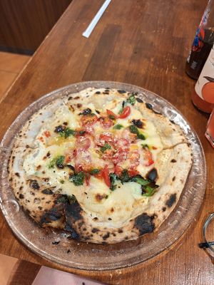  at Unique (V) Pizzeria SUKHASANA in Osaka