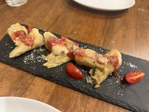 Daily appetizer  at Unique (V) Pizzeria SUKHASANA in Osaka