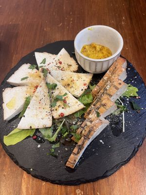 Smoked tofu  at Unique (V) Pizzeria SUKHASANA in Osaka