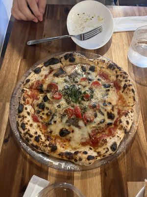   at Unique (V) Pizzeria SUKHASANA in Osaka