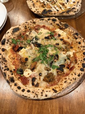   at Unique (V) Pizzeria SUKHASANA in Osaka