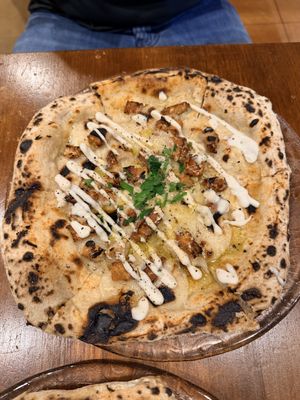   at Unique (V) Pizzeria SUKHASANA in Osaka