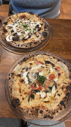   at Unique (V) Pizzeria SUKHASANA in Osaka