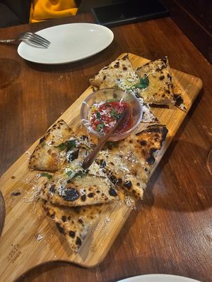  at Unique (V) Pizzeria SUKHASANA in Osaka