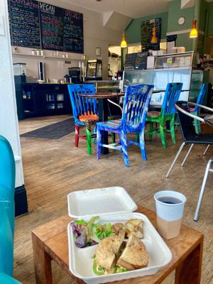 $12 vegan bagel sandwich with seitan (or tofu), incl a small salad, home fries, and a small coffee. Yum, plus excellent vibe, big windows, and comfy chairs (not pictured because currently occupied-by me). at Fiore's Italian Bakery in Jamaica Plain