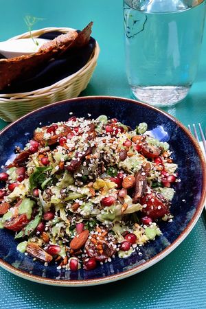Peri-peri salad with fresh bread on the side at Vegan Oasis in Tallinn