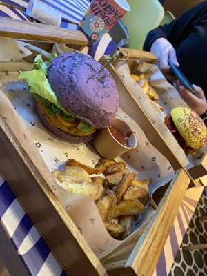 In a menue with water (other drinks for extra-pay) and wedges or edamame. Sauces are also extra with 1€.  at Flower Burger - Corso Garibaldi in Milan