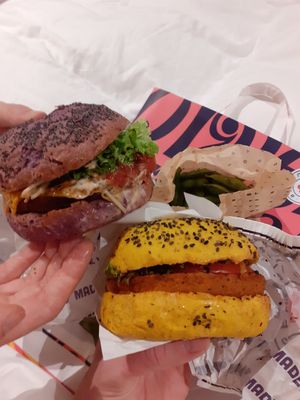 Left: Flower Burger,   Right: Chickpea Burger at Flower Burger in Amsterdam