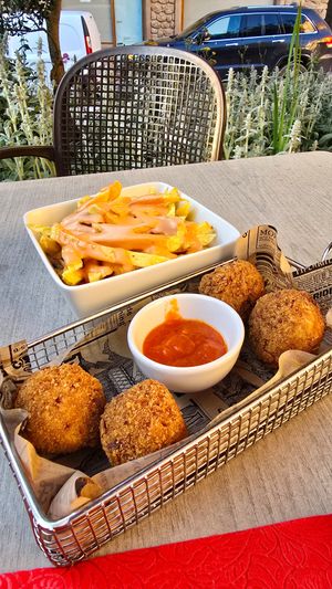 Patatas bravas and arancini at La Vermuteria in Solsona