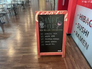 Happy Hour sign at Rock N Roll Sushi in New Orleans